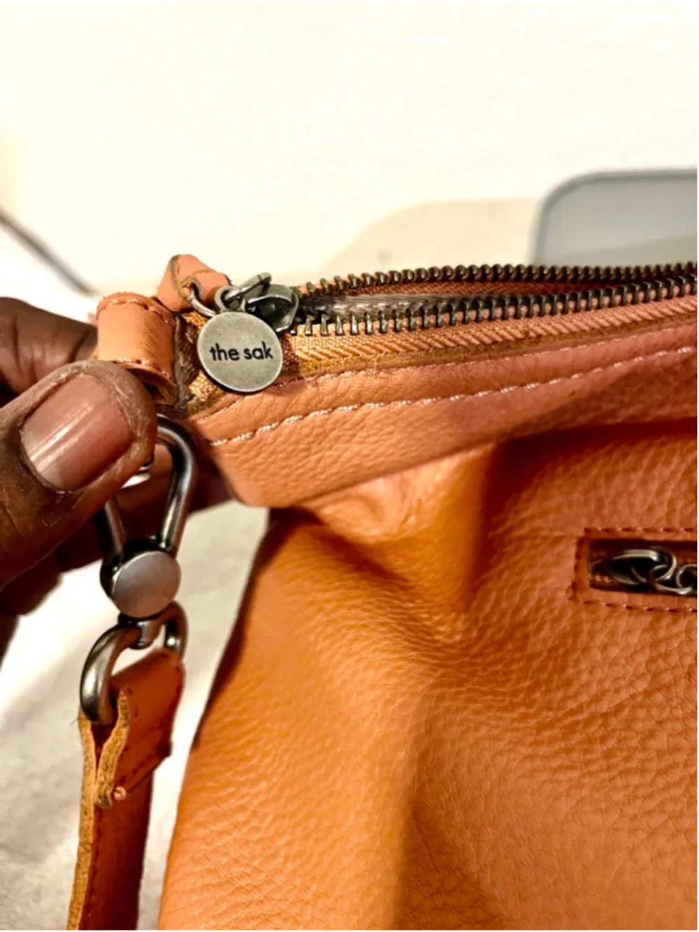 The Sak Jasmine orange leather hobo crossbody bag